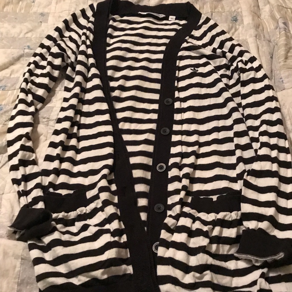 Enjoy this sporty Adidas cardigan.